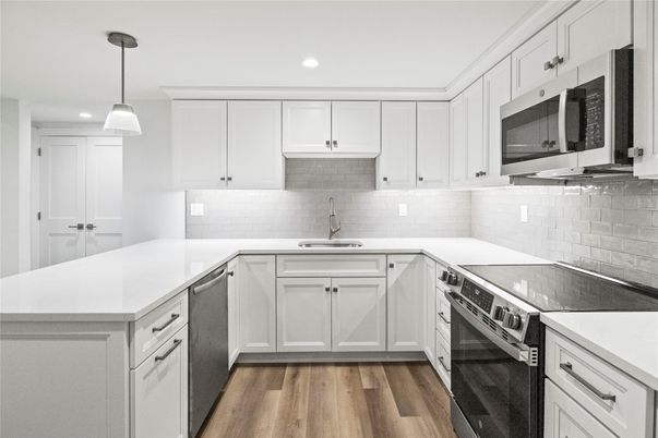 Interior, Kitchen, Pendant Lights, Recessed Lighting, Stainless Steel Appliances, Wood Texture Flooring