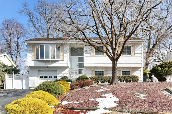 Attached, Exterior, Facade, Raised Ranch