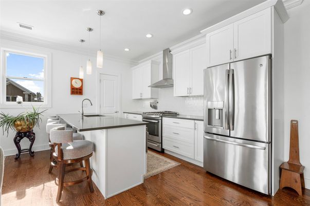 Interior, Kitchen, Pendant Lights, Recessed Lighting, Stainless Steel Appliances, Wood Texture Flooring