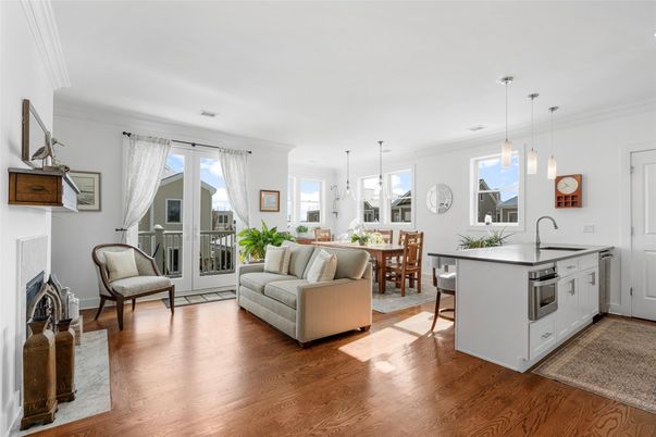 Dining room, Fireplace, Interior, Kitchen, Living room, Pendant Lights, Wood Texture Flooring