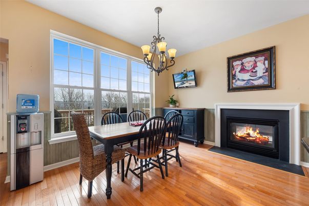 Chandelier, Dining room, Fireplace, Interior, Wood Texture Flooring