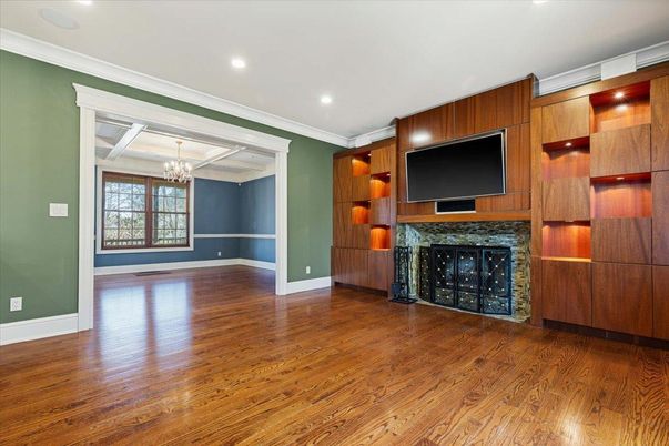 Chandelier, Empty room, Fireplace, Interior, Recessed Lighting, Wood Texture Flooring