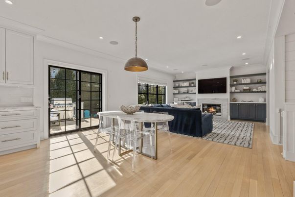 Dining room, Fireplace, Interior, Living room, Pendant Lights, Recessed Lighting, Wood Texture Flooring