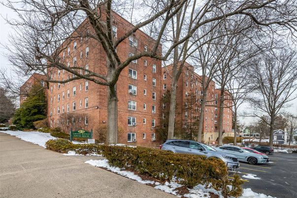 Exterior, Facade, Brick Facade, Condo Building