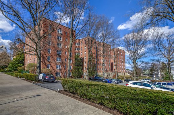 Exterior, Facade, Brick Facade, Condo Building