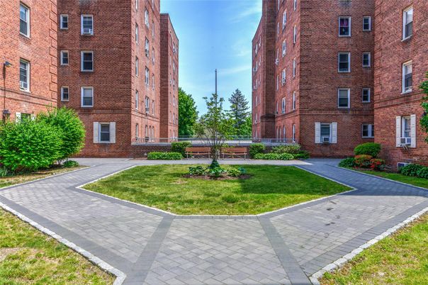 Exterior, Facade, Brick Facade, Condo Building