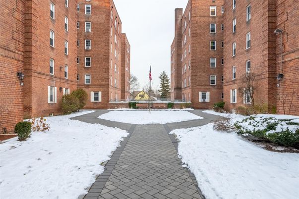 Exterior, Facade, Brick Facade, Condo Building
