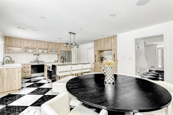 Dining room, Interior, Kitchen, Marble, Marble Walls, Pendant Lights, Recessed Lighting, Stainless Steel Appliances