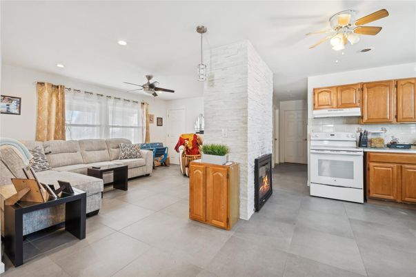 Fireplace, Interior, Kitchen, Living room, Pendant Lights, Recessed Lighting, Stone Walls
