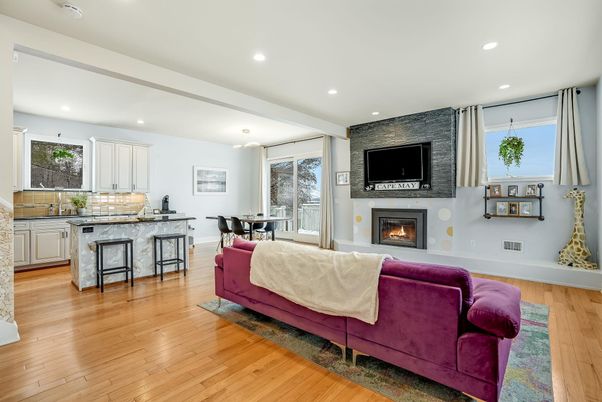 Dining room, Fireplace, Interior, Kitchen, Living room, Recessed Lighting, Wood Texture Flooring