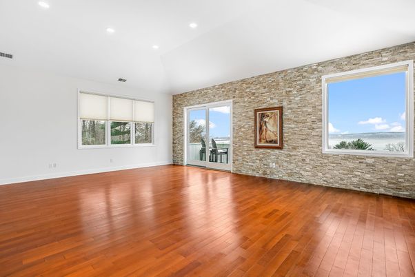 Empty room, Interior, Recessed Lighting, Stone Walls, Wood Texture Flooring