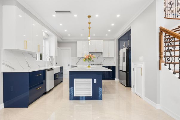 Interior, Kitchen, Marble Walls, Pendant Lights, Recessed Lighting, Stainless Steel Appliances