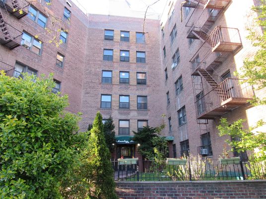 Exterior, Facade, Brick Facade, Condo Building