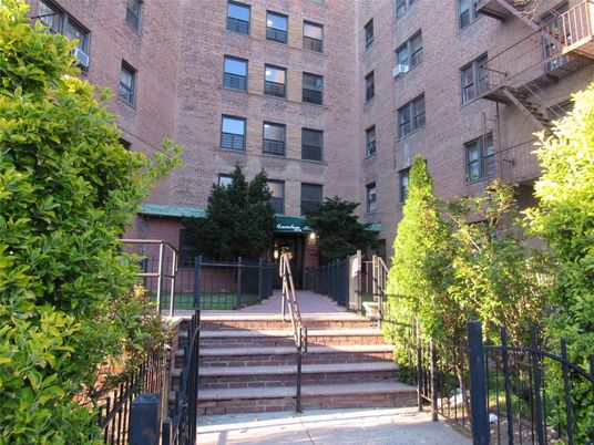 Exterior, Facade, Brick Facade, Condo Building
