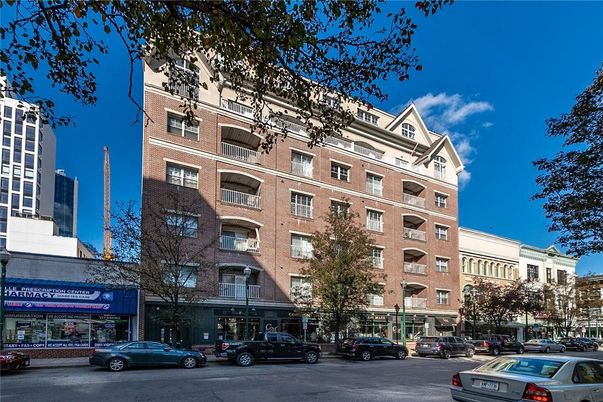 Exterior, Facade, Brick Facade, Condo Building