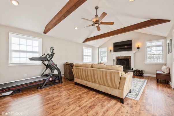 Fireplace, Fitness Equipment, Interior, Living room, Recessed Lighting, Wooden Beams, Wood Texture Flooring