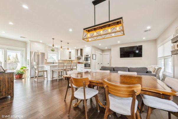 Dining room, Interior, Kitchen, Pendant Lights, Recessed Lighting, Stainless Steel Appliances, Wood Texture Flooring
