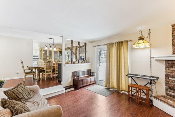 Dining room, Fireplace, Interior, Pendant Lights, Wood Texture Flooring