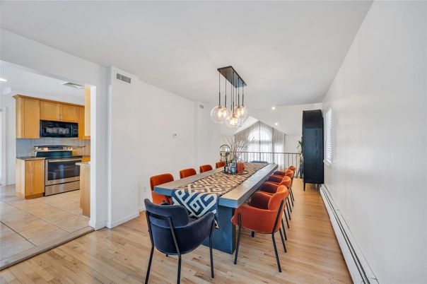 Dining room, Interior, Kitchen, Pendant Lights, Recessed Lighting, Stainless Steel Appliances, Wood Texture Flooring