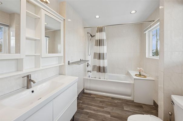 Bathroom, Dual Sink Vanities, Interior, Recessed Lighting, Wood Texture Flooring