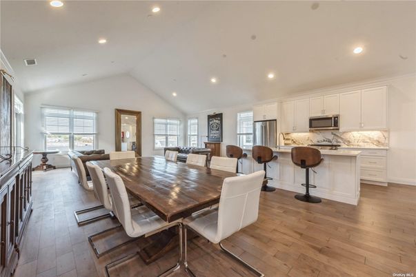 Dining room, Interior, Kitchen, Living room, Recessed Lighting, Stainless Steel Appliances, Wood Texture Flooring