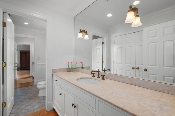 Bathroom, Dual Sink Vanities, Interior, Recessed Lighting, Wood Texture Flooring