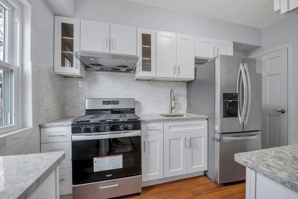 Interior, Kitchen, Marble Walls, Stainless Steel Appliances, Wood Texture Flooring