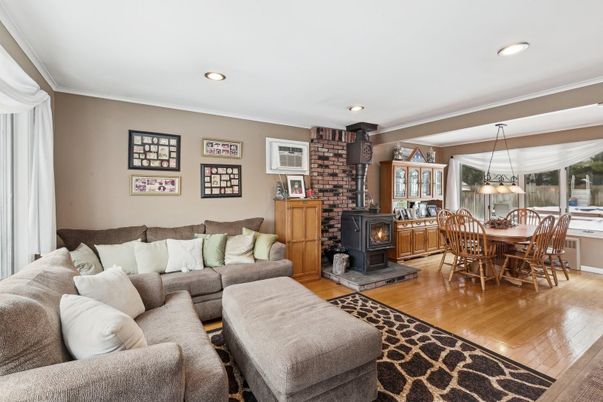 Dining room, Fireplace, Interior, Living room, Pendant Lights, Recessed Lighting, Stone Walls, Wood Texture Flooring