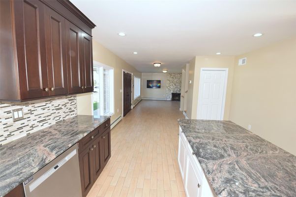 Fireplace, Interior, Kitchen, Recessed Lighting, Wood Texture Flooring