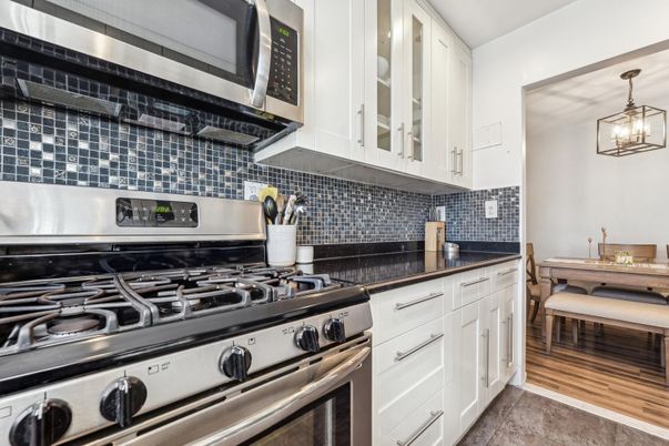 Dining room, Interior, Kitchen, Pendant Lights, Stainless Steel Appliances, Wood Texture Flooring