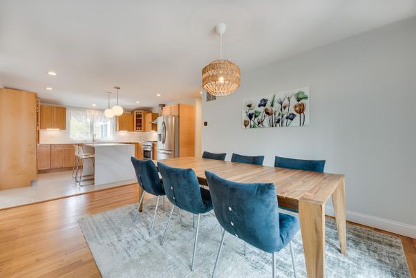 Chandelier, Dining room, Interior, Kitchen, Pendant Lights, Recessed Lighting, Stainless Steel Appliances, Wood Texture Flooring