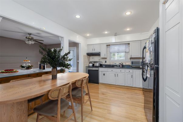 Dining room, Interior, Kitchen, Recessed Lighting, Stainless Steel Appliances, Wood Texture Flooring