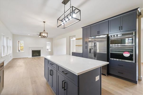 Fireplace, Interior, Kitchen, Pendant Lights, Recessed Lighting, Stainless Steel Appliances, Wood Texture Flooring