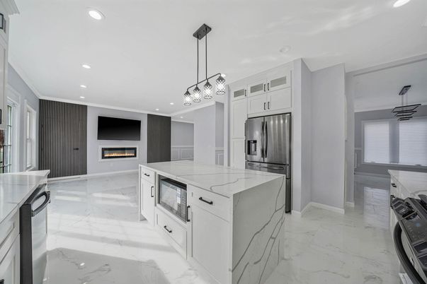 Fireplace, Interior, Kitchen, Marble, Pendant Lights, Recessed Lighting, Stainless Steel Appliances