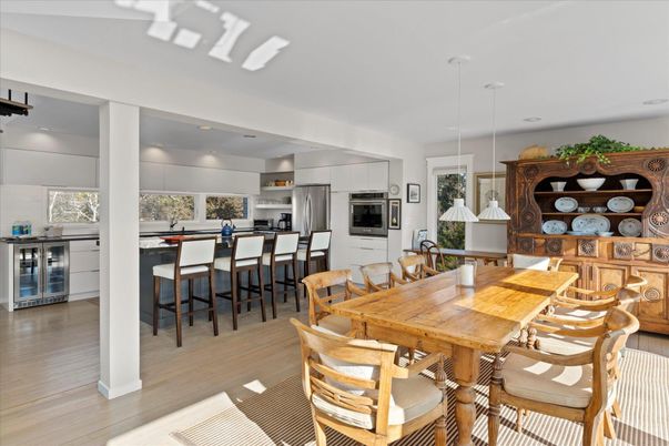 Dining room, Interior, Kitchen, Pendant Lights, Recessed Lighting, Stainless Steel Appliances, Wood Texture Flooring