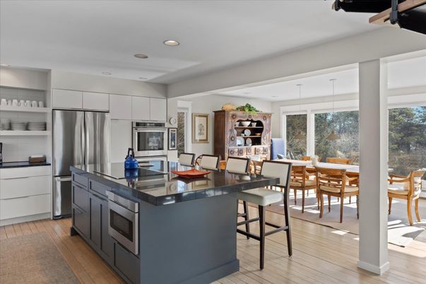 Dining room, Interior, Kitchen, Pendant Lights, Recessed Lighting, Stainless Steel Appliances, Wood Texture Flooring