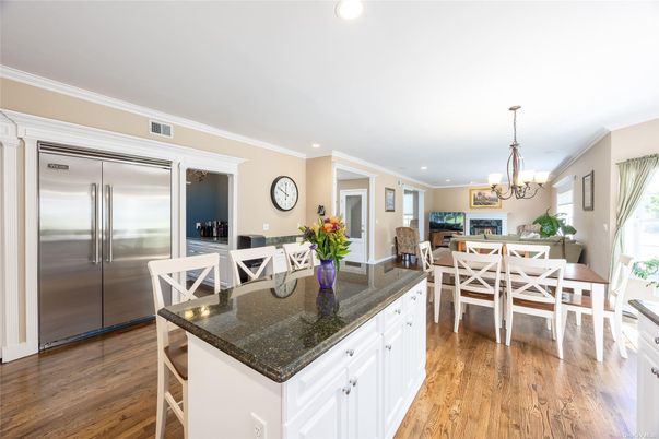 Chandelier, Dining room, Interior, Kitchen, Recessed Lighting, Stainless Steel Appliances, Wood Texture Flooring