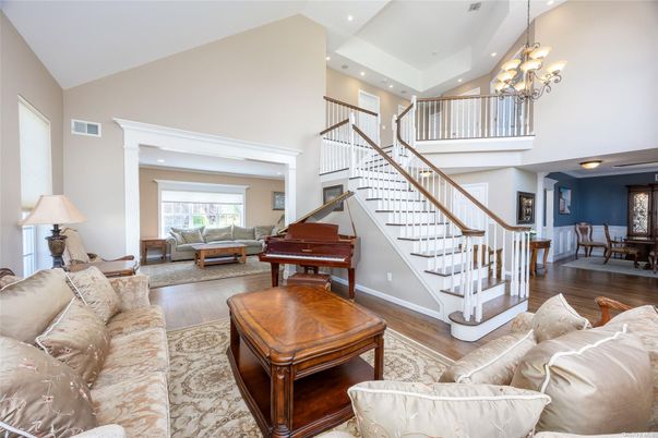 Chandelier, Interior, Living room, Piano, Recessed Lighting, Wood Texture Flooring