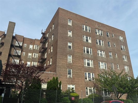 Exterior, Facade, Brick Facade, Condo Building