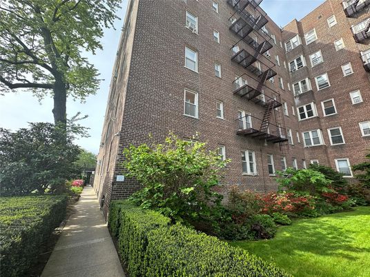 Exterior, Facade, Brick Facade, Condo Building