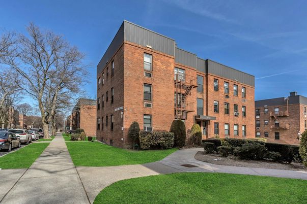 Exterior, Facade, Brick Facade, Condo Building