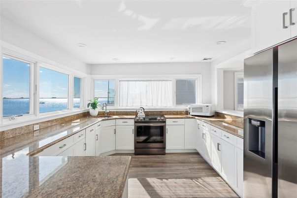 Interior, Kitchen, Recessed Lighting, Stainless Steel Appliances, Water, Wood Texture Flooring