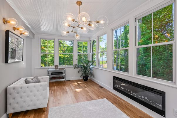 Fireplace, Interior, Pendant Lights, Sun Room, Wood Texture Flooring