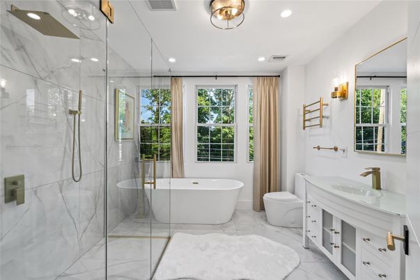 Bathroom, Dual Sink Vanities, Free Standing Baths, Glass Shower, Interior, Marble, Marble Walls, Recessed Lighting
