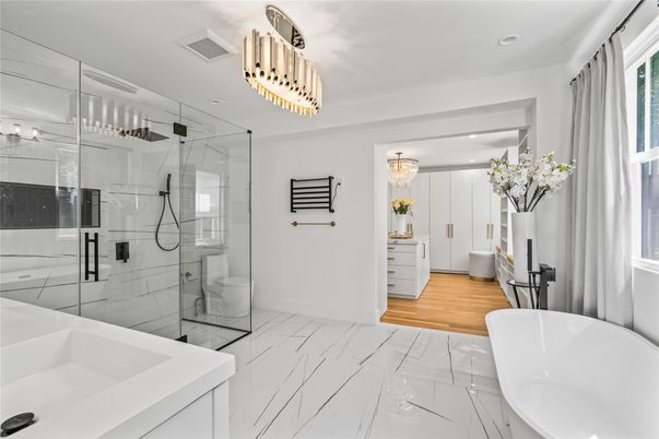 Bathroom, Free Standing Baths, Glass Shower, Interior, Marble, Recessed Lighting, Wood Texture Flooring