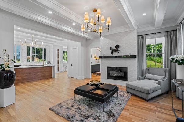 Chandelier, Fireplace, Interior, Living room, Pendant Lights, Recessed Lighting, Wood Texture Flooring
