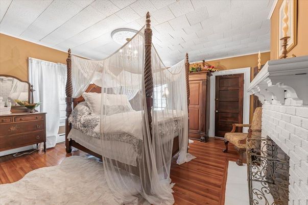 Bedroom, Fireplace, Interior, Stone Walls, Wood Texture Flooring
