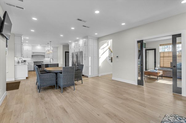 Dining room, Interior, Kitchen, Pendant Lights, Recessed Lighting, Stainless Steel Appliances, Wood Texture Flooring