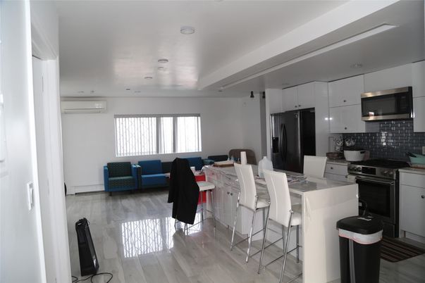 Dining room, Interior, Kitchen, Recessed Lighting, Stainless Steel Appliances, Wood Texture Flooring