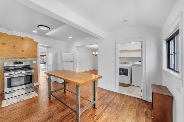 Chandelier, Interior, Kitchen, Recessed Lighting, Stainless Steel Appliances, Wood Texture Flooring